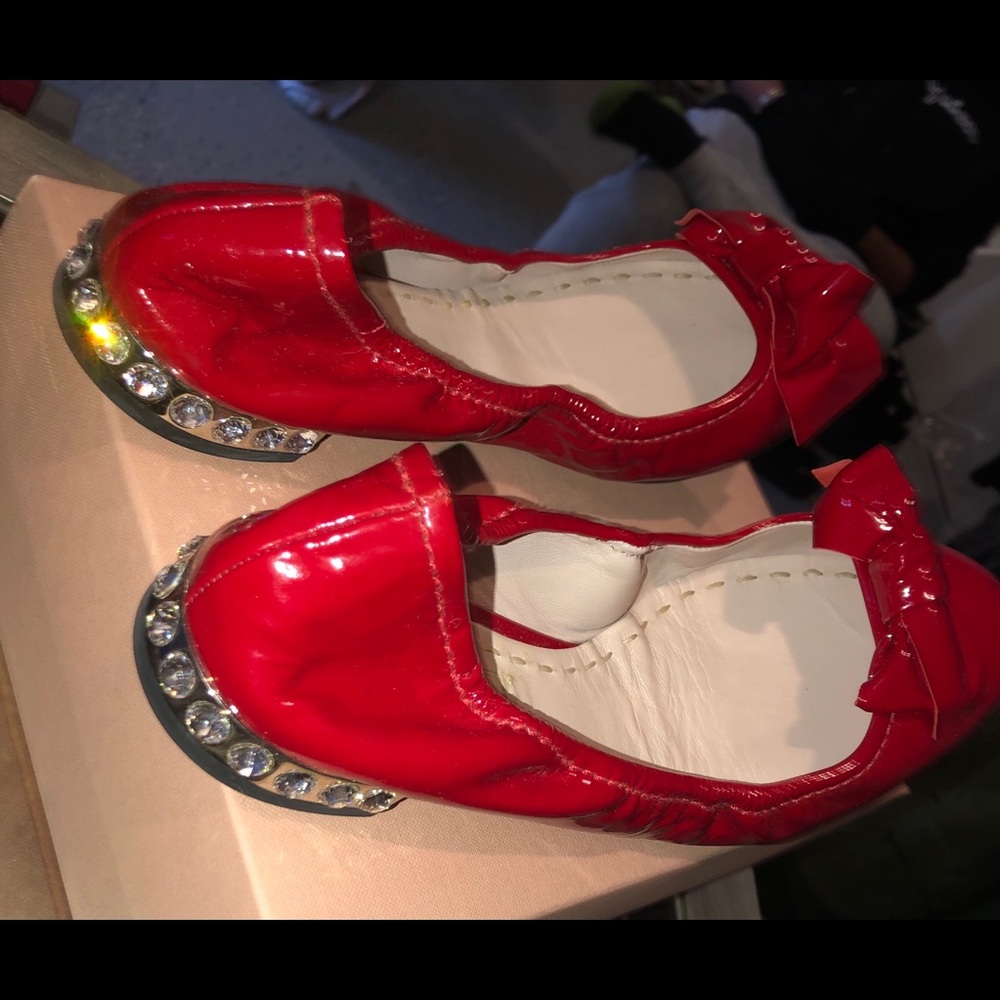 MiuMiu red patent leather bow crystal heel